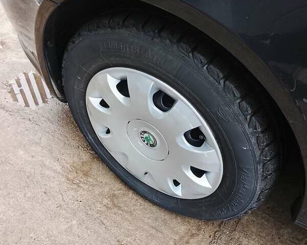 Черный Шкода Октавия, объемом двигателя 1.4 л и пробегом 233 тыс. км за 6950 $, фото 26 на Automoto.ua