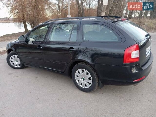 Черный Шкода Октавия, объемом двигателя 1.6 л и пробегом 149 тыс. км за 8799 $, фото 4 на Automoto.ua
