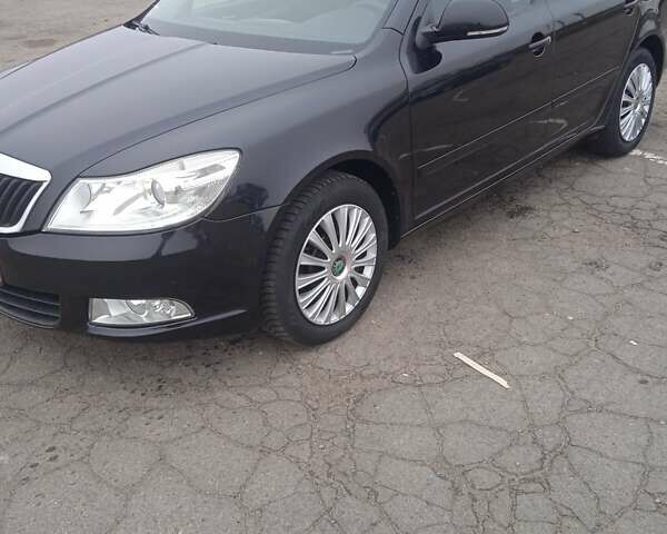 Чорний Шкода Октавія, об'ємом двигуна 1.6 л та пробігом 193 тис. км за 7400 $, фото 5 на Automoto.ua