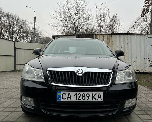 Черный Шкода Октавия, объемом двигателя 1.8 л и пробегом 320 тыс. км за 7500 $, фото 1 на Automoto.ua