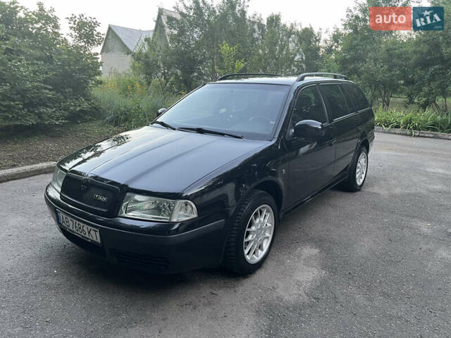Черный Шкода Октавия, объемом двигателя 1.6 л и пробегом 183 тыс. км за 7099 $, фото 2 на Automoto.ua