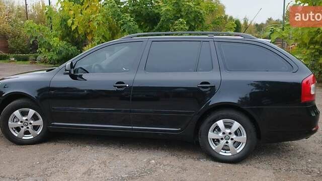 Чорний Шкода Октавія, об'ємом двигуна 1.6 л та пробігом 209 тис. км за 8299 $, фото 8 на Automoto.ua