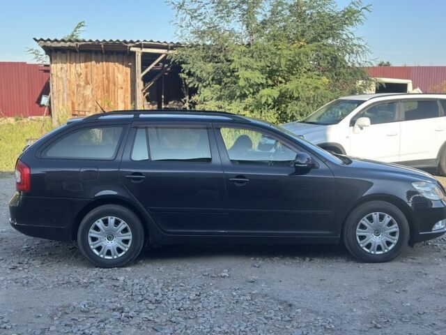 Черный Шкода Октавия, объемом двигателя 1.6 л и пробегом 149 тыс. км за 6350 $, фото 1 на Automoto.ua