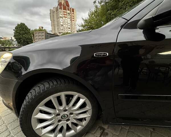 Черный Шкода Октавия, объемом двигателя 1.8 л и пробегом 206 тыс. км за 9400 $, фото 1 на Automoto.ua