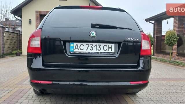 Чорний Шкода Октавія, об'ємом двигуна 1.6 л та пробігом 227 тис. км за 7499 $, фото 3 на Automoto.ua