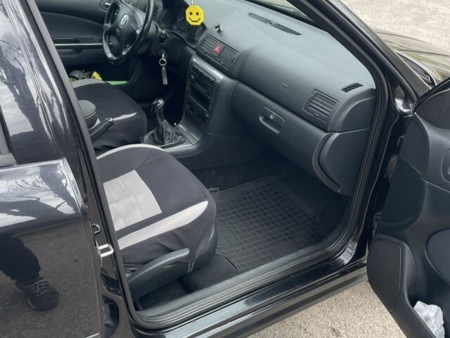 Черный Шкода Октавия, объемом двигателя 1.6 л и пробегом 201 тыс. км за 5650 $, фото 10 на Automoto.ua