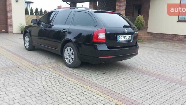 Чорний Шкода Октавія, об'ємом двигуна 1.6 л та пробігом 227 тис. км за 7499 $, фото 2 на Automoto.ua