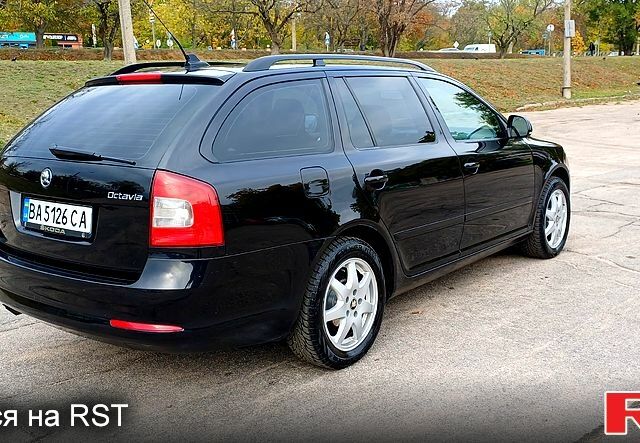 Черный Шкода Октавия, объемом двигателя 1.8 л и пробегом 176 тыс. км за 7800 $, фото 1 на Automoto.ua