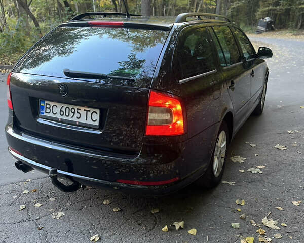 Черный Шкода Октавия, объемом двигателя 1.8 л и пробегом 185 тыс. км за 6400 $, фото 2 на Automoto.ua