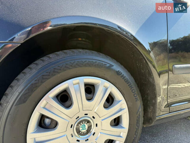 Шкода Октавия 2009 в Виннице на Automoto.ua Черный Шкода Октавия, объемом двигателя 1.6 л и пробегом 172 тыс. км за 7999 $, фото 6 на Automoto.ua