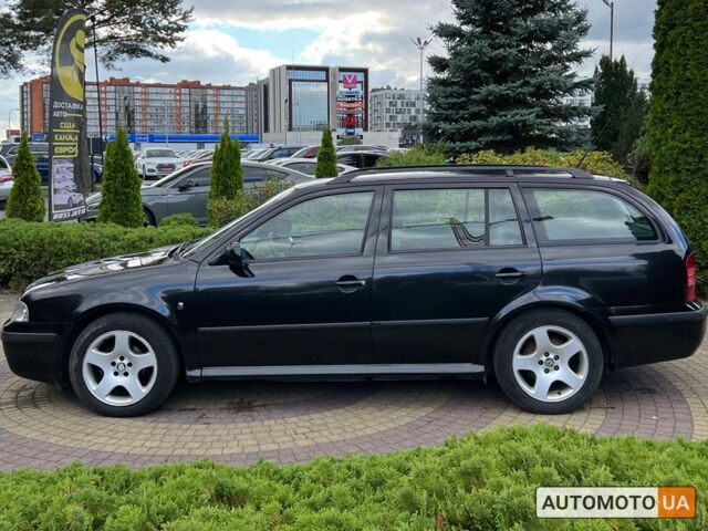 Черный Шкода Октавия, объемом двигателя 1.6 л и пробегом 265 тыс. км за 7250 $, фото 2 на Automoto.ua