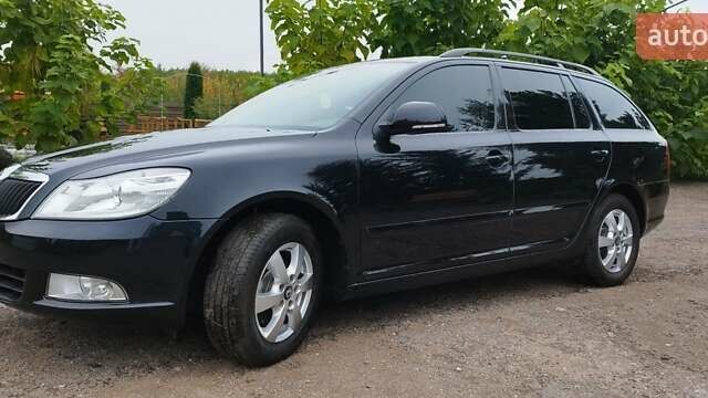 Чорний Шкода Октавія, об'ємом двигуна 1.6 л та пробігом 209 тис. км за 8299 $, фото 6 на Automoto.ua
