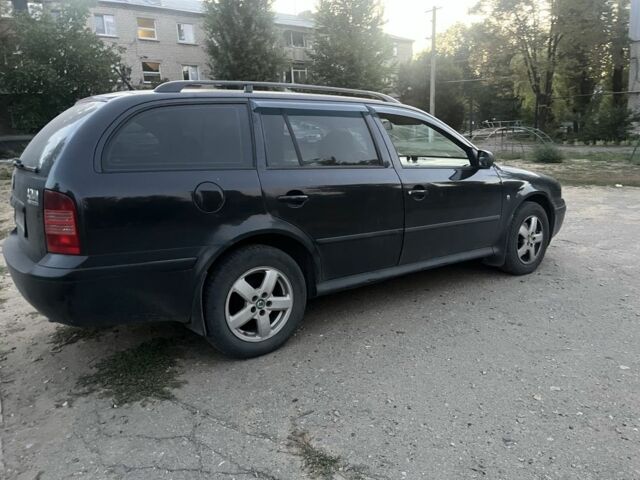 Черный Шкода Октавия, объемом двигателя 1.9 л и пробегом 185 тыс. км за 4990 $, фото 1 на Automoto.ua