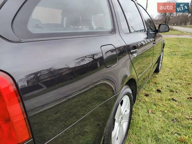 Чорний Шкода Октавія, об'ємом двигуна 1.6 л та пробігом 200 тис. км за 7800 $, фото 12 на Automoto.ua