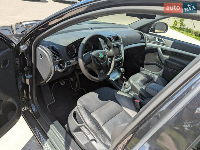 Черный Шкода Октавия, объемом двигателя 1.98 л и пробегом 176 тыс. км за 12400 $, фото 7 на Automoto.ua