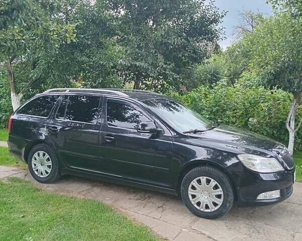 Чорний Шкода Октавія, об'ємом двигуна 1.2 л та пробігом 215 тис. км за 6300 $, фото 11 на Automoto.ua