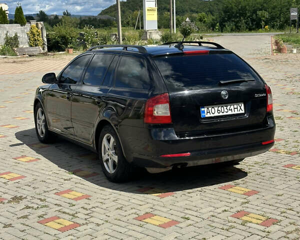 Чорний Шкода Октавія, об'ємом двигуна 2 л та пробігом 296 тис. км за 7800 $, фото 3 на Automoto.ua
