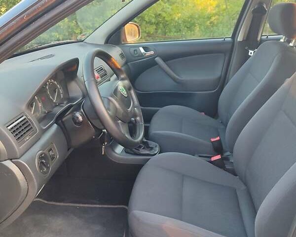 Черный Шкода Октавия, объемом двигателя 1.6 л и пробегом 179 тыс. км за 6750 $, фото 54 на Automoto.ua