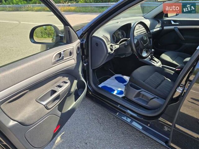 Черный Шкода Октавия, объемом двигателя 1.6 л и пробегом 212 тыс. км за 9299 $, фото 24 на Automoto.ua