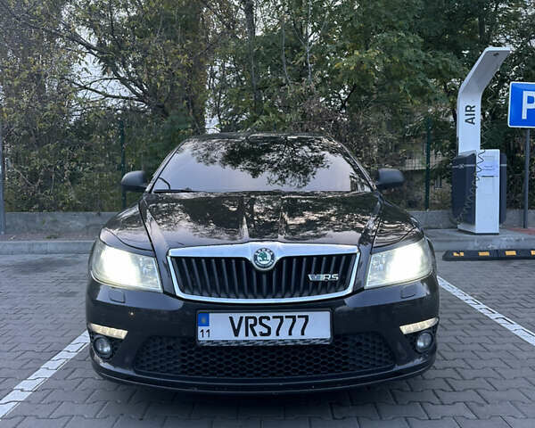 Черный Шкода Октавия, объемом двигателя 2 л и пробегом 255 тыс. км за 9000 $, фото 1 на Automoto.ua