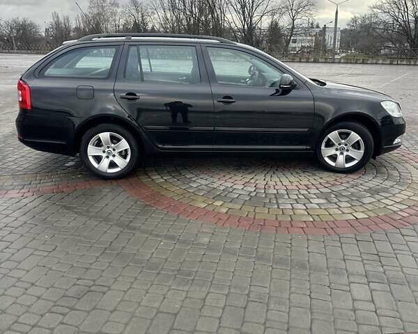 Черный Шкода Октавия, объемом двигателя 1.4 л и пробегом 233 тыс. км за 8199 $, фото 2 на Automoto.ua