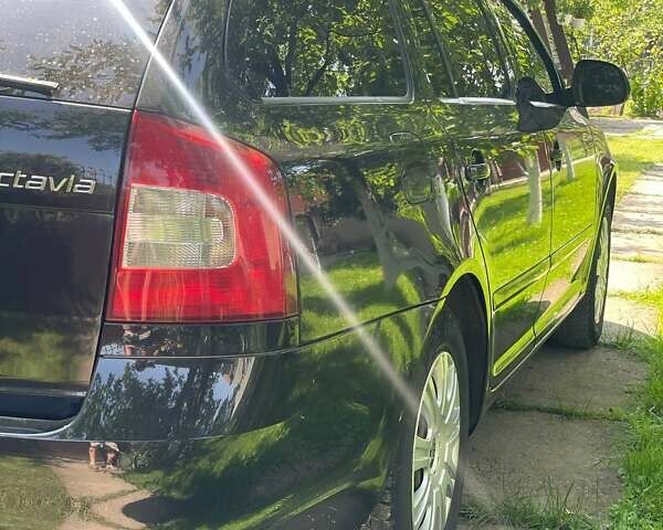 Чорний Шкода Октавія, об'ємом двигуна 1.2 л та пробігом 215 тис. км за 6300 $, фото 15 на Automoto.ua