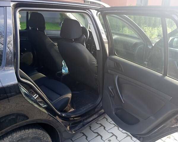 Черный Шкода Октавия, объемом двигателя 1.6 л и пробегом 298 тыс. км за 6500 $, фото 8 на Automoto.ua