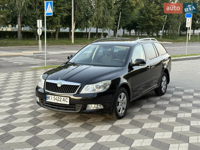 Черный Шкода Октавия, объемом двигателя 1.39 л и пробегом 227 тыс. км за 7550 $, фото 1 на Automoto.ua