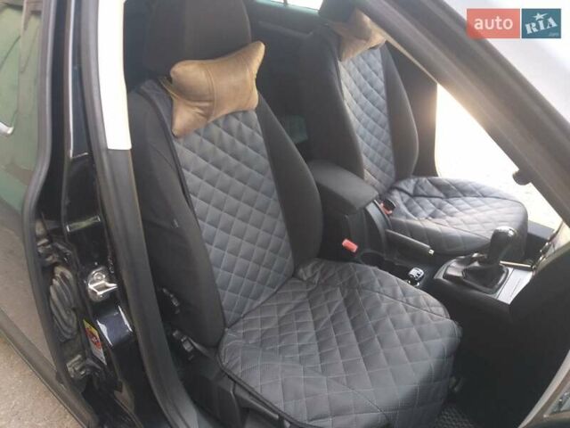 Черный Шкода Октавия, объемом двигателя 1.6 л и пробегом 317 тыс. км за 7500 $, фото 3 на Automoto.ua