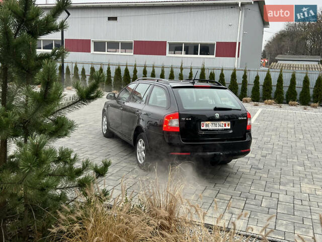 Черный Шкода Октавия, объемом двигателя 2 л и пробегом 229 тыс. км за 11650 $, фото 173 на Automoto.ua