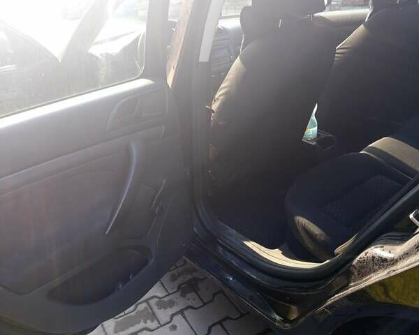 Черный Шкода Октавия, объемом двигателя 1.6 л и пробегом 298 тыс. км за 6500 $, фото 14 на Automoto.ua