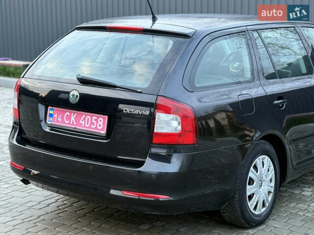 Черный Шкода Октавия, объемом двигателя 1.6 л и пробегом 202 тыс. км за 7490 $, фото 95 на Automoto.ua