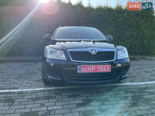 Черный Шкода Октавия, объемом двигателя 1.6 л и пробегом 226 тыс. км за 7850 $, фото 1 на Automoto.ua