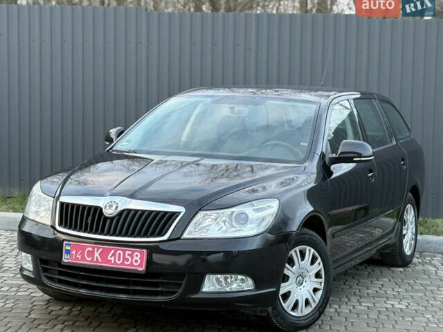 Черный Шкода Октавия, объемом двигателя 1.6 л и пробегом 202 тыс. км за 7490 $, фото 1 на Automoto.ua