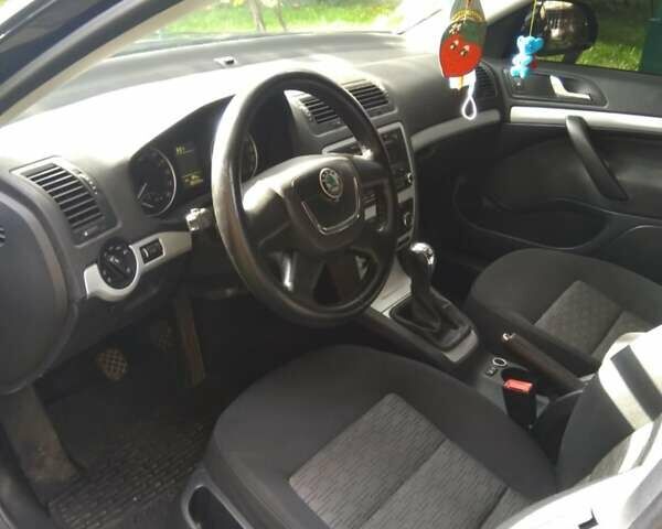 Черный Шкода Октавия, объемом двигателя 1.6 л и пробегом 265 тыс. км за 7650 $, фото 1 на Automoto.ua