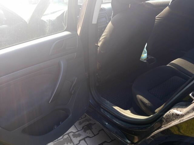 Черный Шкода Октавия, объемом двигателя 1.6 л и пробегом 298 тыс. км за 6500 $, фото 15 на Automoto.ua