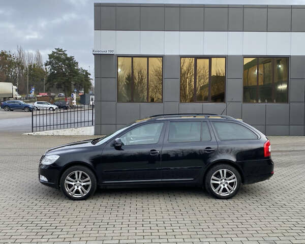 Черный Шкода Октавия, объемом двигателя 2 л и пробегом 241 тыс. км за 8800 $, фото 1 на Automoto.ua