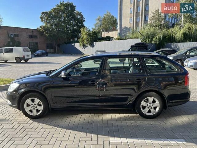 Чорний Шкода Октавія, об'ємом двигуна 2 л та пробігом 203 тис. км за 8900 $, фото 7 на Automoto.ua