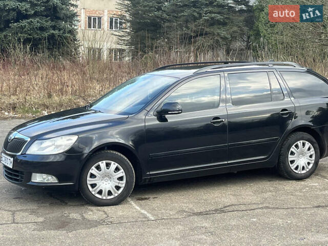 Черный Шкода Октавия, объемом двигателя 1.6 л и пробегом 236 тыс. км за 6400 $, фото 1 на Automoto.ua