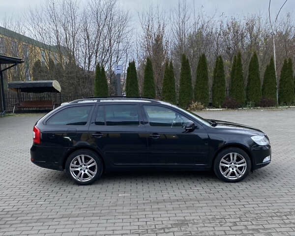 Чорний Шкода Октавія, об'ємом двигуна 2 л та пробігом 241 тис. км за 8800 $, фото 5 на Automoto.ua