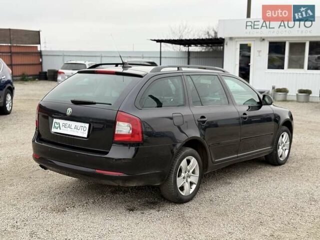 Черный Шкода Октавия, объемом двигателя 1.39 л и пробегом 219 тыс. км за 8300 $, фото 1 на Automoto.ua