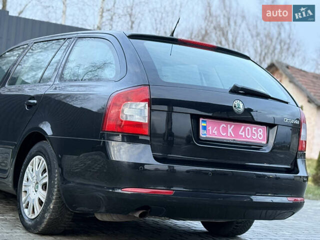 Черный Шкода Октавия, объемом двигателя 1.6 л и пробегом 202 тыс. км за 7490 $, фото 111 на Automoto.ua