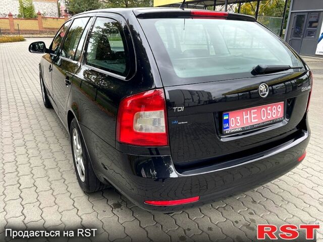Черный Шкода Октавия, объемом двигателя 1.6 л и пробегом 209 тыс. км за 9500 $, фото 2 на Automoto.ua
