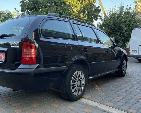 Черный Шкода Октавия, объемом двигателя 1.6 л и пробегом 198 тыс. км за 6700 $, фото 22 на Automoto.ua