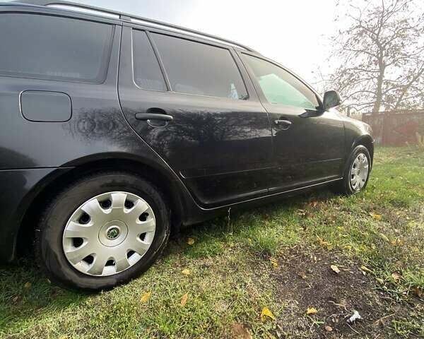 Черный Шкода Октавия, объемом двигателя 1.6 л и пробегом 275 тыс. км за 7300 $, фото 4 на Automoto.ua