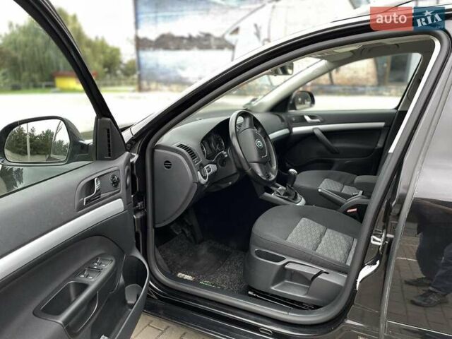 Черный Шкода Октавия, объемом двигателя 1.4 л и пробегом 274 тыс. км за 6950 $, фото 5 на Automoto.ua