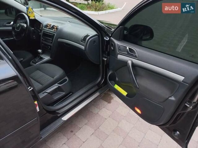 Чорний Шкода Октавія, об'ємом двигуна 1.6 л та пробігом 303 тис. км за 8200 $, фото 2 на Automoto.ua