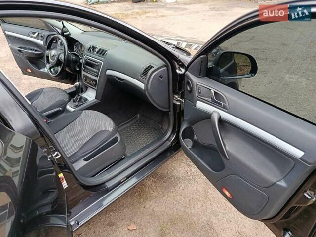 Черный Шкода Октавия, объемом двигателя 1.6 л и пробегом 258 тыс. км за 8600 $, фото 13 на Automoto.ua