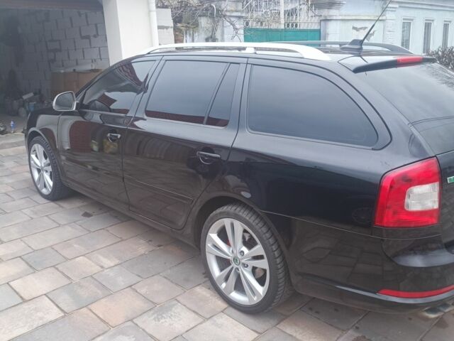 Черный Шкода Октавия, объемом двигателя 2 л и пробегом 170 тыс. км за 10500 $, фото 1 на Automoto.ua