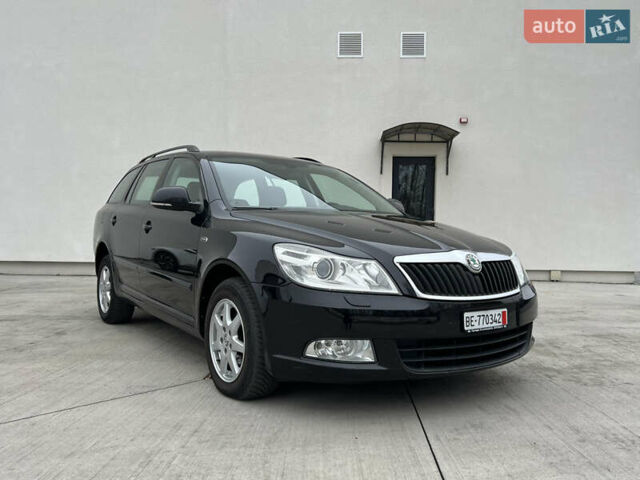 Черный Шкода Октавия, объемом двигателя 2 л и пробегом 229 тыс. км за 11650 $, фото 4 на Automoto.ua